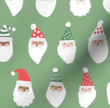Cheerful Santas in Green